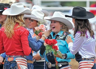 Matt Hinshaw/The Daily Courier<br /><br /><!-- 1upcrlf2 -->Savannah Flick reacts to being named the 2012 Prescott Frontier Days World’s Oldest Rodeo Queen on Monday afternoon before the start of the final rodeo performance in Prescott.