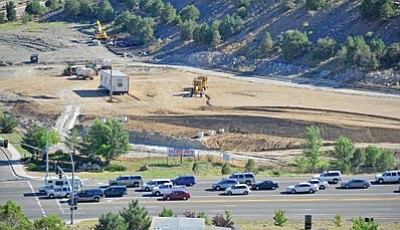 Matt Hinshaw/The Daily Courier<br>
Construction crews work on the future site of Trader Joe’s Friday afternoon in Prescott.   

