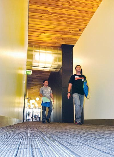 Les Stukenberg/The Daily Courier<br>
Jeffrey Liu and Alexander Maynard walk down the hallway as they attend the orientation for new students at NAU/Yavapai Campus in Prescott Valley Monday afternoon.