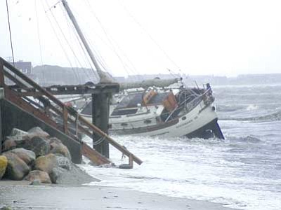 Shayne Durrance/Courtesy<br>Shayne Durrance of Prescott Valley captured this image of a boat wreck Sunday on Cape Cod in Provincetown, Mass., in the aftermath of Hurricane Irene.