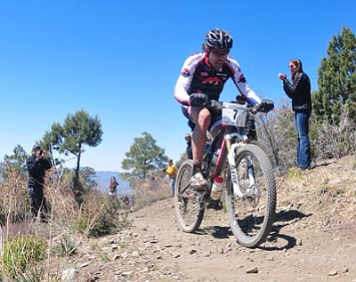 Les Stukenberg/The Daily Courier<br>
Chris Sheppard climbs a hill near the Sierra Prieta overlook during the Whiskey Off-Road Pro 50 mountain bike race on May 1.
