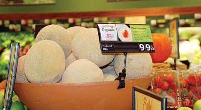 Lisa Irish/The Daily Courier<br>
Organic cantaloupes from a certified organic farm in California for sale at the New Frontiers Natural Marketplace in Prescott are not part of the recall of cantaloupes linked to a recent listeriosis outbreak, said general manager Philip Morris.