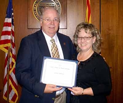 Courtesy photo<br>Arizona House Speaker Andy Tobin, R-Paulden honors Barbara Mikkelsen, site director for U.S. Vets in Prescott.
