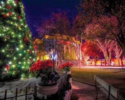 Rich Charpentier/Courtesy photo<br>
The 2011 Acker holiday card features the holiday-lit courthouse plaza.