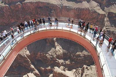 The Grand Canyon Skywalk on the Hualapai Reservation, which offers a glass deck for viewing the canyon from above, has been the subject of years of litigation.  JC Amberlyn/Kingman Daily Miner
