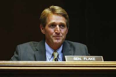 Sen. Jeff Flake, R-Ariz., a member of the Senate Energy and Natural Resources Subcommittee on Water and Power, questions witnesses about how best to conserve water and protect the Colorado River. Emilie Eaton/Cronkite News<br /><br /><!-- 1upcrlf2 -->