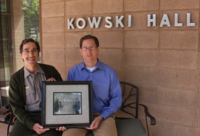 Chuck Wahler, an Albright Training Center instructor, presents Thomas Seidenkrantz with a framed picture of his grandmother, Lois Kowski. Submitted photo<br /><br /><!-- 1upcrlf2 -->