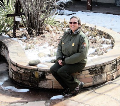 Interpretive Ranger Graciela Avila creates booklets for the junior ranger program at Grand Canyon National Park. Loretta Yerian/WGCN