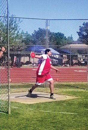 Neegho Kaska hurls a discus 78.6 meters. Photos/Monica Nanacasia