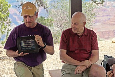 Al Richmond (right) chairman and CEO of the Arizona State Railroad Museum, presents Dr. Tom Myers with the Grand Canyon Hall of Fame award. Photo/Wayne Ranney