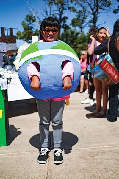 Ellanina Nacasia shows off her Earth costume during Earth Day at the park visitor center. Loretta Yerian/WGCN