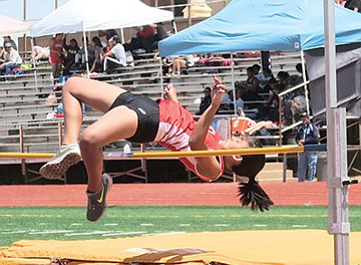 Jessica Richardson competes in the high jump during the Winslow meet. Photo/Kim Besom