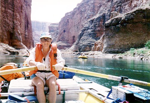 Bernice Lewis boats on the Colorado River.