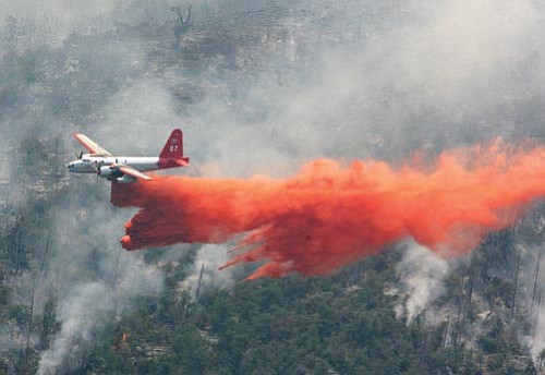 Les Stukenberg, file photo/The Daily Courier
Heavy Air Tanker 07 drops a load of retardant on the northern edge of Lane 2 fire near Crown King, Ariz., on June 30, 2008.
