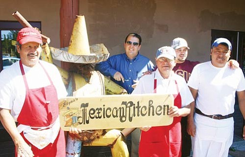 <br>Patrick Whitehurst/WGCN<br>
Employees of Sophie's Mexican Kitchen, pictured above with John Dillon, second from the left, will provide food for Friday's Tusayan fiesta event. Dillon is director and chief operating officer for the Western Discovery Museum.