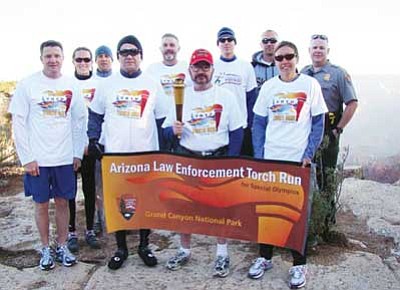 Submitted photo<br>
Participants in the 2010 Torch Run stand at the South Rim of the Grand Canyon.