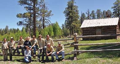 <br>Photo courtesy Kaibab National Forest<br>
The 2010 North Kaibab Youth Conservation Crew at Three Lakes Cabin. From left to right: Crew leaders Carrie Veety and Shari Walls, Caden Anderson, Tayler Honey, Ciara Black (kneeling), Aaron Holsten, Ian Hiscock, Tammi Tisi, James Schuster and TJ Goodnow.