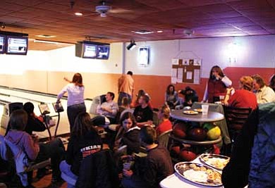 Clara Beard/WGCN<br>
Mixer attendees bowl before Tim Martin discussed the Torch Run to be held in April.