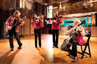 Photo/James Ewing<br>
From left: Ralph Farris (viola), Jennifer Choi (violin), Cornelius Dufallo (violin) and Dorothy Lawson (cello) of ETHEL perform this weekend at Shrine of Ages.