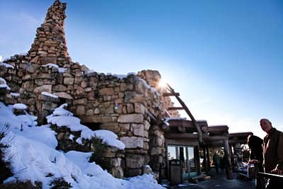 Ryan Williams/WGCN<br>
Henry Karpinski, Xanterra employee and Grand Canyon historian, admires one of Mary Jane Colter’s signature designs, Hermit’s Rest, built in 1914 at the Grand Canyon South Rim.