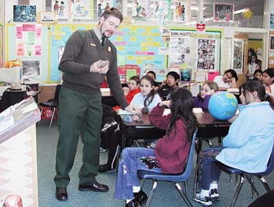 Submitted photo<br>
An Environmental Education Specialist works with students at Grand Canyon School.