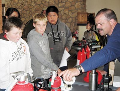 Photo/WGCN<br>
Acting Director of Emergency Operations at Grand Canyon Dave Van Inwagen discusses fire safety with Grand Canyon youth at a previous Health and Wellness Fair.


