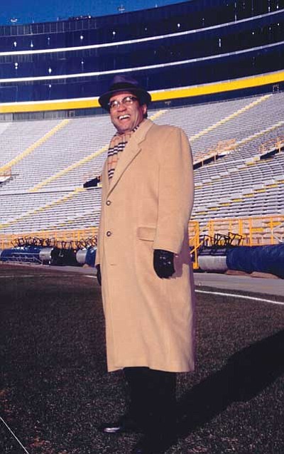 Courtesy photo<br>
Pinero at Lambeau Field in Green Bay, Wisc. When he performed his show for ex-Packer players, some thought the coach had come back to life.

