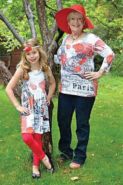 Shania Moore, 8, 
and her grandmother 
Diana Vanmoorlehem 
pose wearing pieces of 
Allie Ollie’s new clothing line, which will be launched 
Saturday, April 26. <br>
Courtesy photo