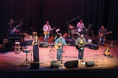 “Time in a Bottle” will play the Elks Theatre on Saturday, including Scotty Pearson on guitar; Kayla Kenzior, who performs as Carole King; John Waxman, as James Taylor and others; and J.D. Madrid, who sings James Croce melodies, and music of others, as well.<br>
Courtesy photo
