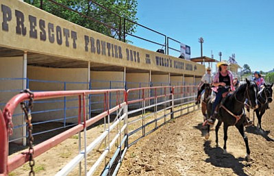 Riders for the 2014 Prescott Frontier Days, “World’s Oldest Rodeo” Grand Entry go through a few practice runs without flags on a recent Saturday morning at the Prescott Rodeo Grounds.<br> 
 Photo by Matt Hinshaw