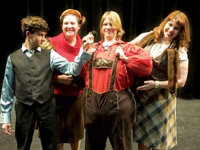 Les Stukenberg/The Daily Courier<br>
Jessie Janisch as Phineous Trout, Tamra Pinson as 1st Mrs. Gloop, Cody Pinson as Augustus Gloop, and Brianna Reed as 2nd Mrs. Gloop pose during a dress rehersal for "Willy Wonka - the Musical."