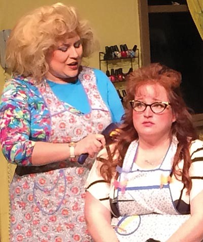 Truvy (Janelle Devin) brushes Annelle's (Amber Bosworth) hair. "Steel Magnolias" opens at Prescott Center for the Arts on Thursday, April 9. (Jason Wheeler/The Daily Courier)