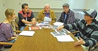 Matt Hinshaw/The Daily Courier<br>Local musicians, from left, Chloe Stuff, Sky Conwell, Buddy Moeck, Tres Ikner, and Kai Beamer discuss the Grammy Award nominees for Record of the Year, Artist of the Year, and the relevance of the Grammys themselves Wednesday afternoon in Prescott.