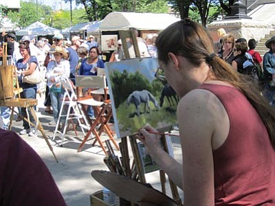 Courtesy photo<br>
Sarah Phippen competes in the “Quick Draw” event during the 38th Annual Phippen Museum Western Art Show and Sale this past weekend on the courthouse plaza. Phippen is the granddaughter of the late George Phippen, a founding member of the Cowboy Artists of America. 
