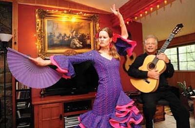 Les Stukenberg/The Daily Courier<br>
Ana and Tony Cocilovo demonstrate their flamenco passion at their Prescott home.