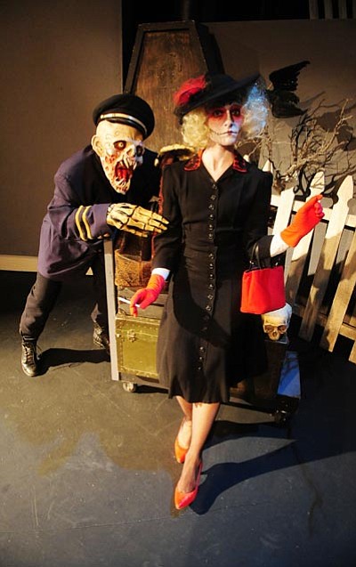 Les Stukenberg/The Daily Courier<br>
A ghoul porter and  Winnie Ruth Judd (Laura Prosseda) enact the story of the Arizona Trunk Murderess in the annual Prescott Center for the Arts Ghost Talk. 
