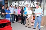 Photos courtesy of Jeff Patton
Members of the Chamber of Commerce and Historical Society cut the ribbon to celebrate the Old Trails Museum's Grand Re-opening on Aug. 3