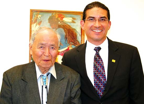 <i>Photo by Barbara Smith</i><br>
Senator John Pinto (left) and New Mexico Cabinet Secretary for Indian Affairs Alvin Warren pose for a photo at the New Mexico State Capitol on Jan 22.