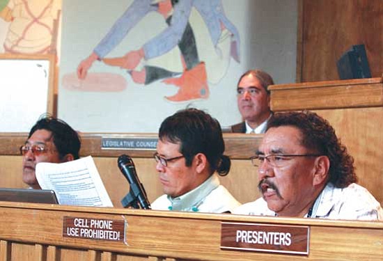 <i>Courtesy photo</i><br>
"Navajo Green Jobs" legislation co-sponsor Amos Johnson, Green Jobs member Tony Skrelunas and Navajo Council Speaker Lawrence T. Morgan converse during the 21st Navajo Nation Council's summer session.