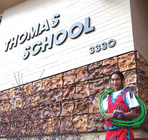 <i>Wells Mahkee Jr./NHO</i><br>
Nakotah LaRance of Flagstaff stands in front of the Thomas School on Thursday, Oct. 29. LaRance, a former student at the school, gave a special dance performance for students and staff prior to his departure on Sunday to Montreal to begin touring with the world-reknowned Cirque du Soleil dance troupe.