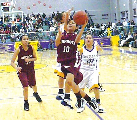 <i>Anton Wero/NHO</i><br>
Shiprock Lady Chieftain Courtney Benally (10) drives and shoots for a score around Kirtland defenders. Kirtland defeated Shiprock 65 to 53.