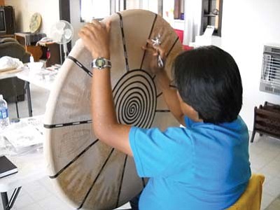 <i>Rosanda Suetopka Thayer</i><br>
2009 Hopitutuqaiki art student Carliss Sinquah works on a piece required for completion of his art school course. Small size and personal attention is what makes this school a major success.