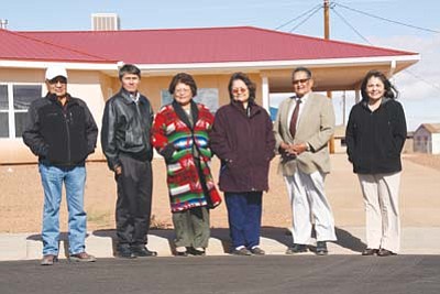 <i>Courtesy photo</i><br>
Johnnie Gee, NHA; Louis Sheperd, NHA; Delores Lee, NHA; Emma Yazzie, Luepp Schools Inc. acting principal; Henry Moore Jr, Luepp Schools Inc. board president; and Ernestine Singer, Luepp Schools Inc. assistant principal standing in front of newly developed housing complex.
