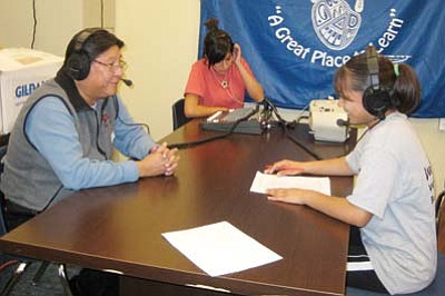 Photo/Stan Bindell<br>
Burt Poley getting interviewed by Hopi High School’s Otivia “Big O” Puhuhefvaya on  KUYI.