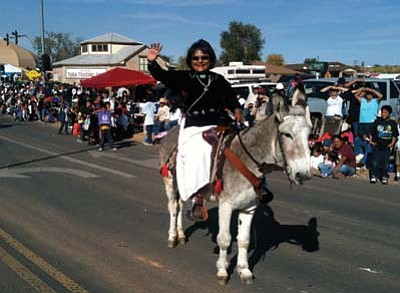 Photo/George Hardeen<br>
Coconino County District 5 Supervisor Lena Fowler rode the honorable donkey at the  Western Navajo Fair Parade in Tuba City last Saturday. Fowler said this was her way to honor the memory of Chief Manuelito and Navajo values of old. Her trusty mount is Jumpin’ Jack Flash and is owned by Cleveland Haskan of Kayenta.