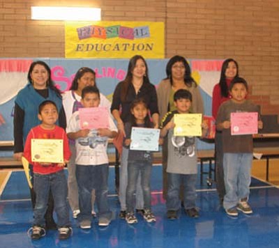 Submitted Photo<br>
Front left to right: Taishan Little, Kyle Secody, Darshena Yazzie, Geronie Cleigh Pesodas, and Ernest Sellers Jr. Back left to right: Ms. Kathy Alajas, Ms. Maria Gumanoy, Ms. Peggy Santillan, Ms. Natalie Tsinijinnie and Ms. Lou Darcera