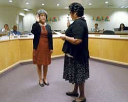 Tribal Council Secretary Martha Mase conducts Oath of Office to Associate Judge Marilyn Fredericks. Joining Judge Fredericks during her Oath of Office was mother Ada Fredericks, daughter Anna, sisters Charlene, Evelyn and Sharon. A reception followed at the new Youth Court where Judge Fredericks will preside.