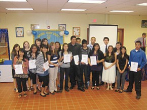 Members of Hopi High School’s National Honor Society smile for the camera following the annual induction ceremony.