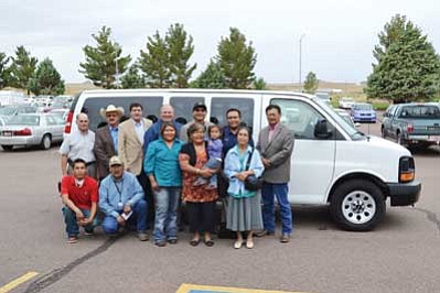 Senior citizens of the Chilchinbeto Chapter will benefit from the donation of a 15-passenger van. Pictured from left to right (back row) are Homero Vela, Supervisor JR DeSpain, Supervisor Jerry Brownlow, Supervisor David Tenney, Supervisor Jonathan M. Nez, JB Kinlacheeny and Supervisor Jesse Thompson. Front row from left are Jarvis Willie, Leo Sheppard, Kyla Redmustache, Mary Keahey, Kylina Redmustache and Marie Charlie. Submitted photo