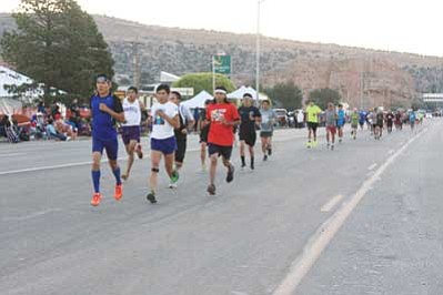 Runners bless the Navajo Nation Fair parade route in Window Rock Sept. 8. Submitted photo